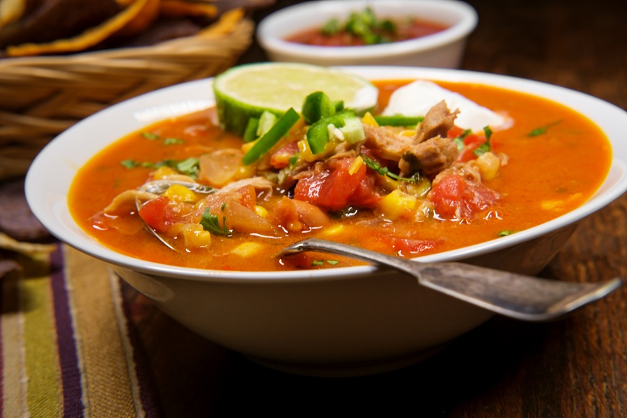 tex mex soup in bowl with chicken corn and black beans