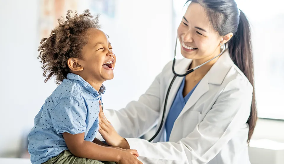 Child and provider during a check up