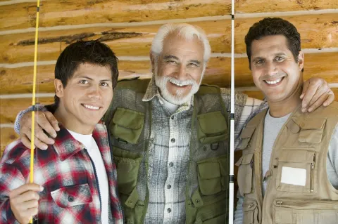 dad with 2 adult sons ready to go fishing