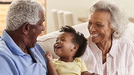 Image of happy grandparents with grandkids